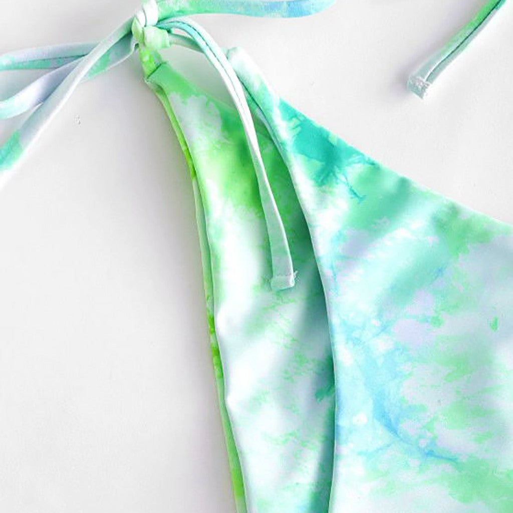 Green and blue  bikini top on a white background