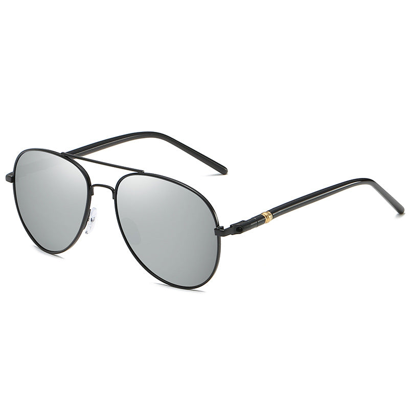 Black sunglasses with reflective lenses on a white background