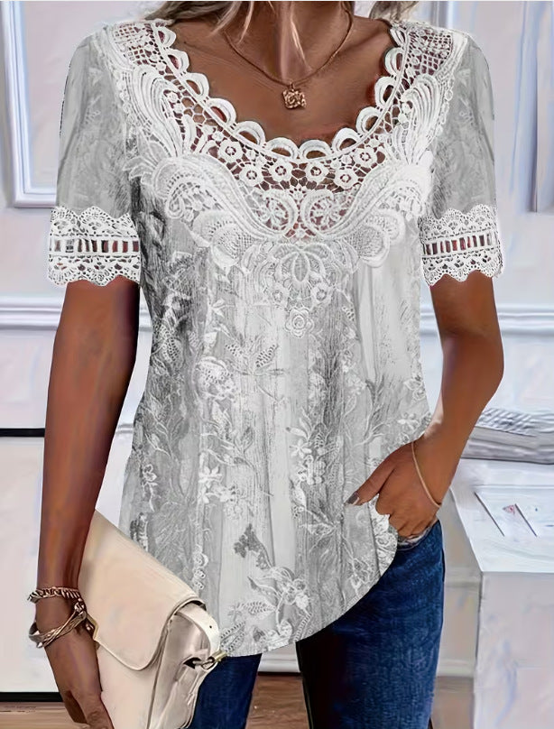 Woman wearing a gray lace top with a blurred background
