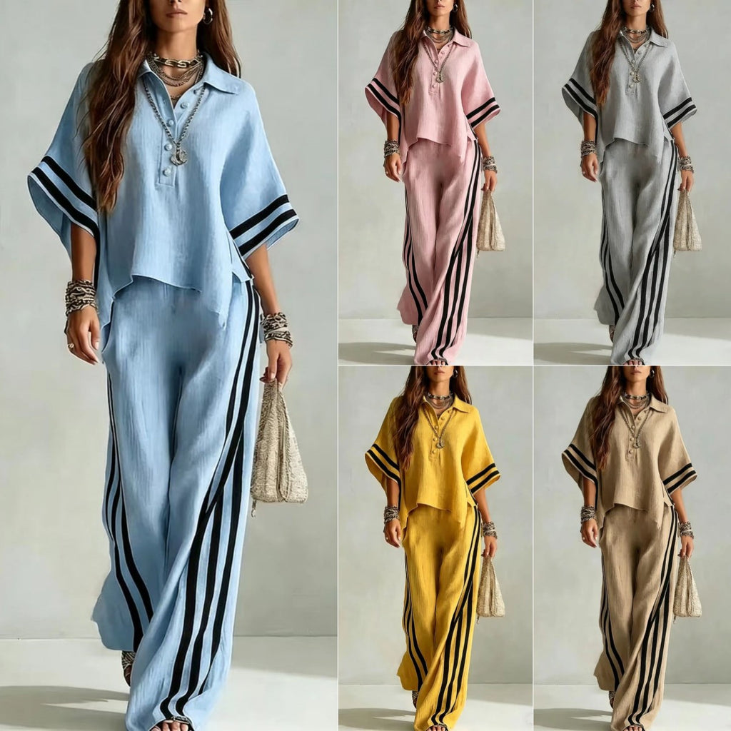 Woman modeling a two-piece outfit with striped pants and a top in various colors on a plain background.