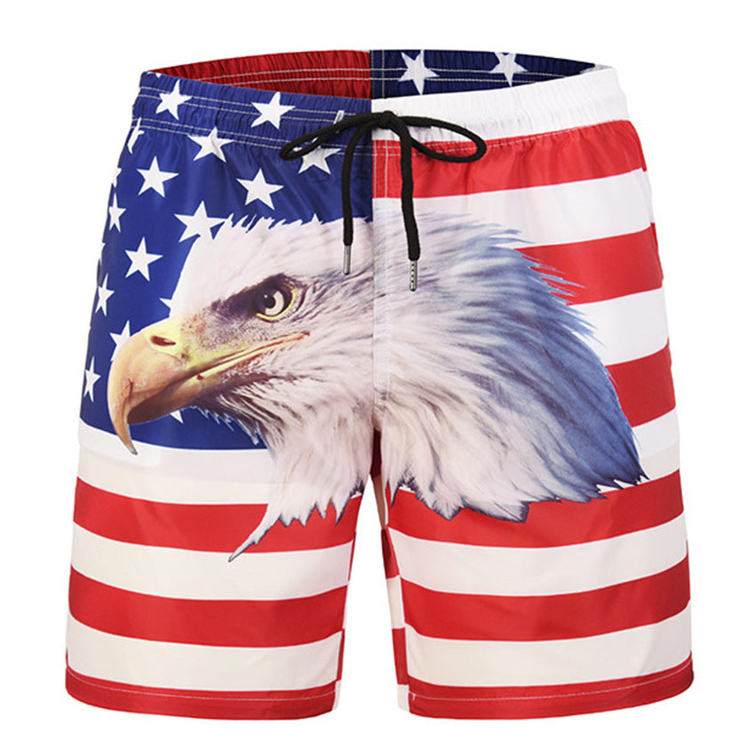 Swim shorts with American flag design and eagle print on a white background