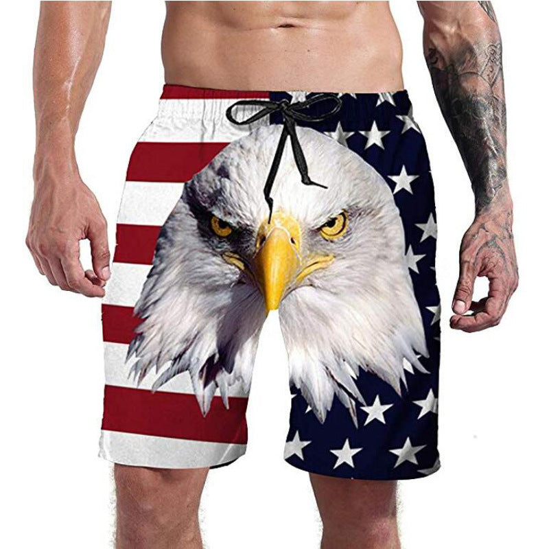 Beach shorts with an eagle design on a white background