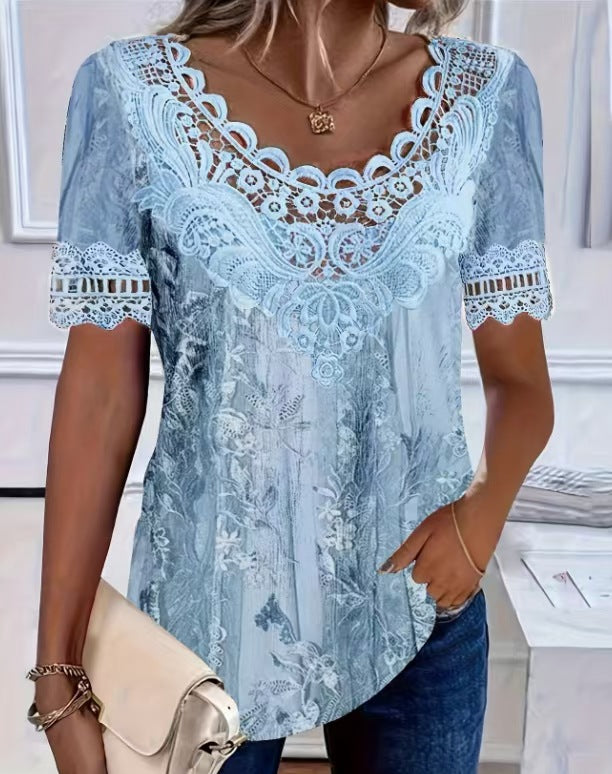 Woman wearing a light blue lace top with a blurred indoor background