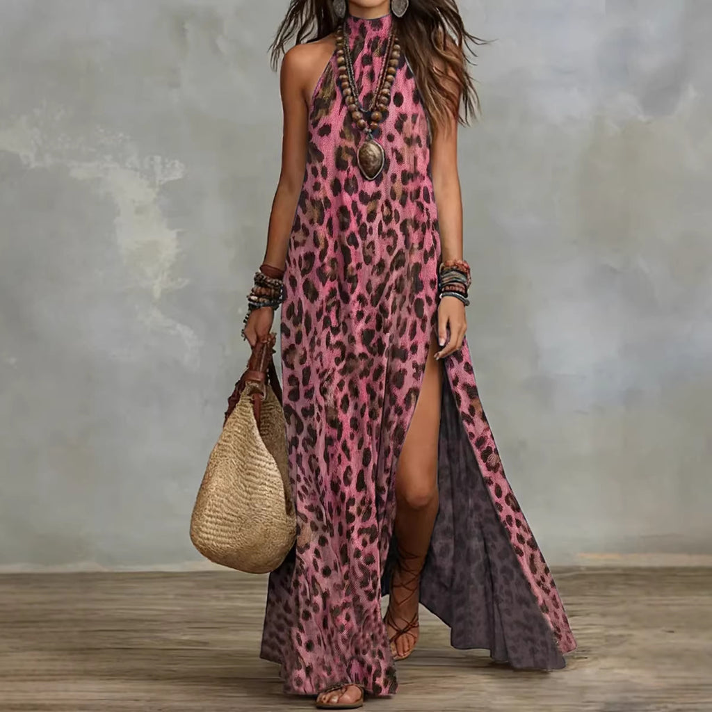 Woman wearing a pink leopard print dress with a neutral background
