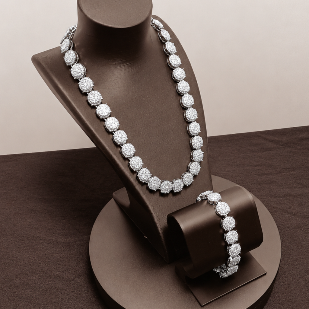 Pearl necklace on a brown jewelry stand against a beige background