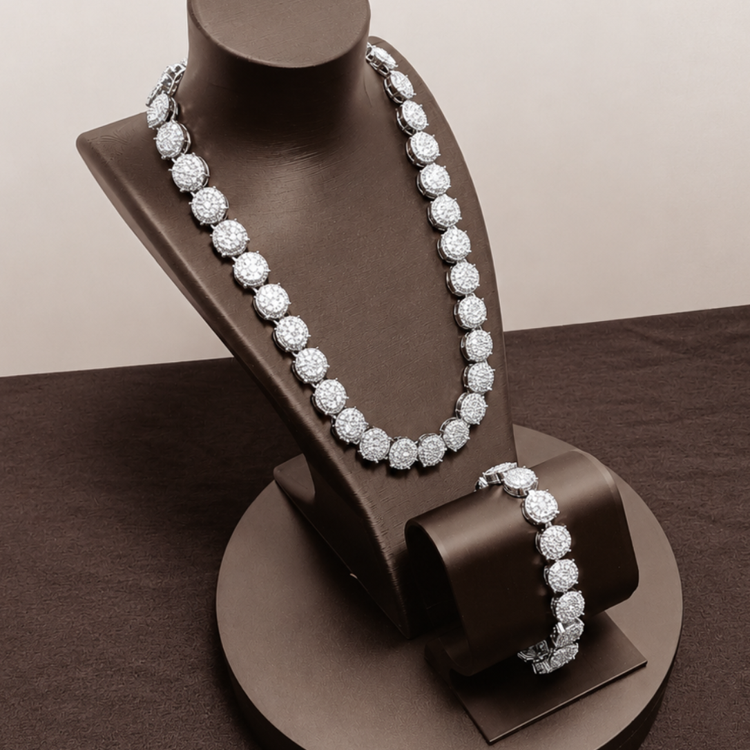 Pearl necklace on a brown jewelry stand against a beige background
