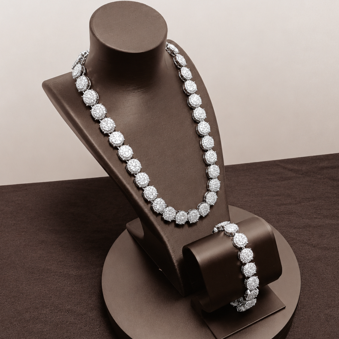 Pearl necklace on a brown jewelry stand against a beige background