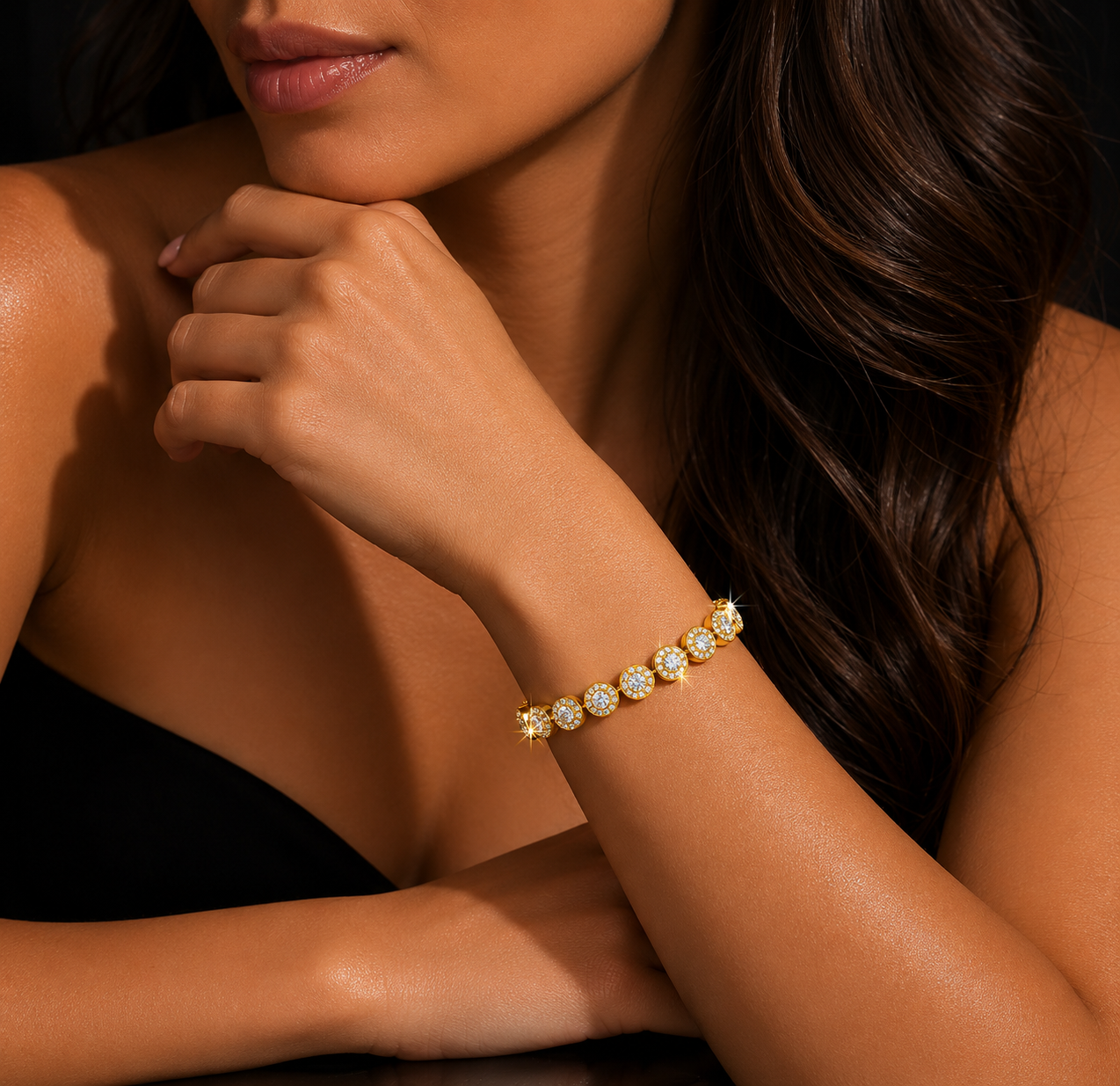 Woman wearing a gold cz with diamonds on a dark background