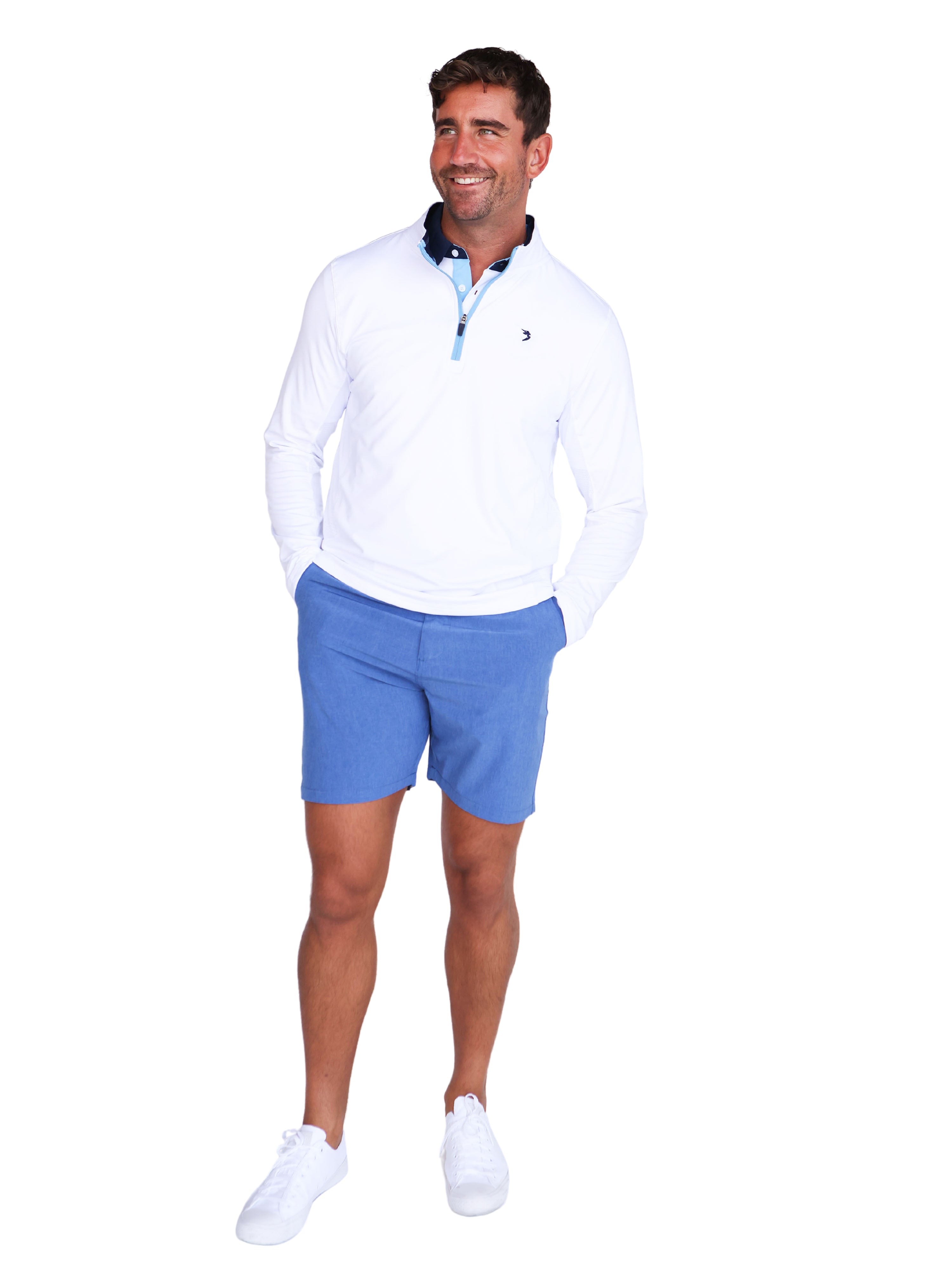 Man wearing a white shirt and blue shorts on a white background