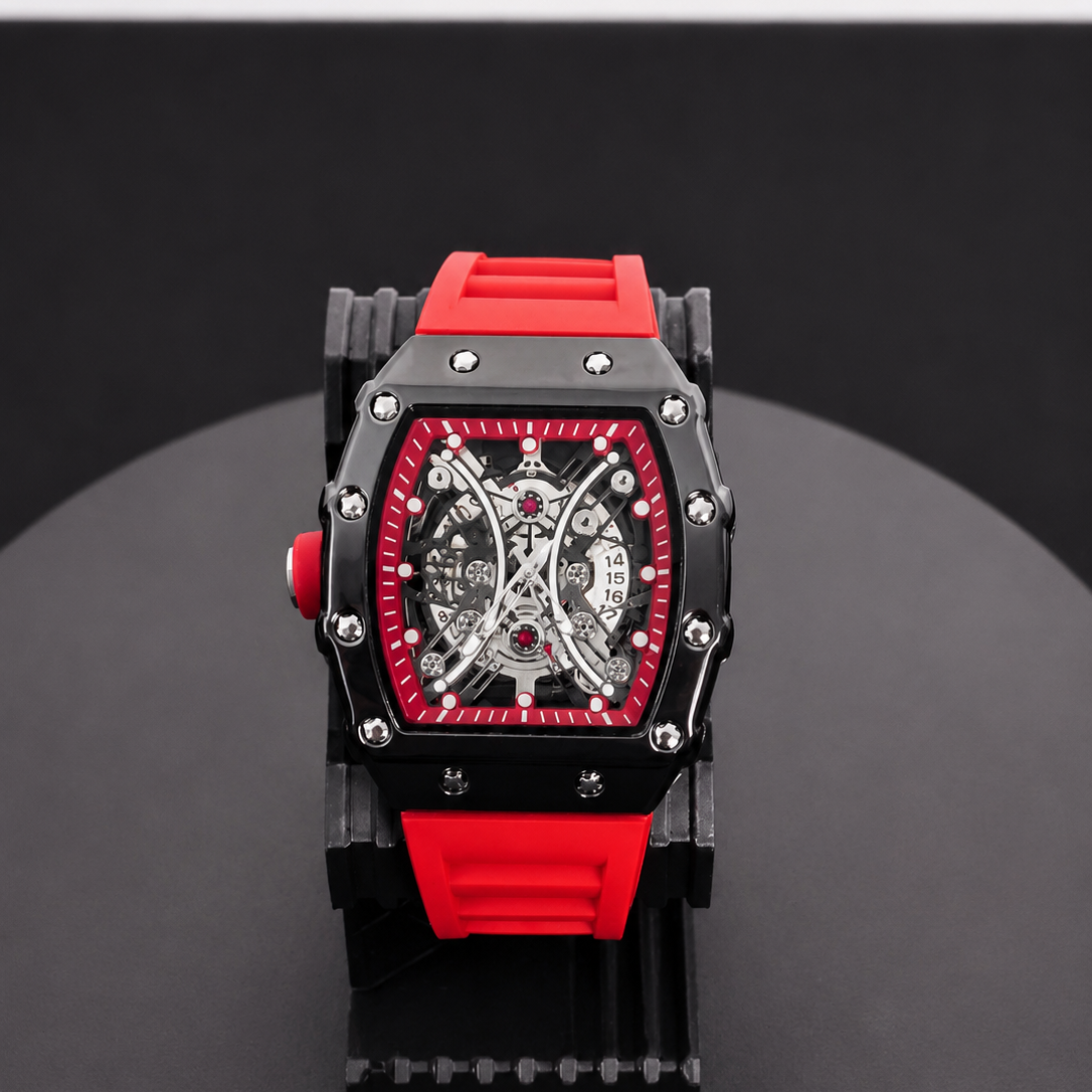 Luxury watch with red and black design on a dark background