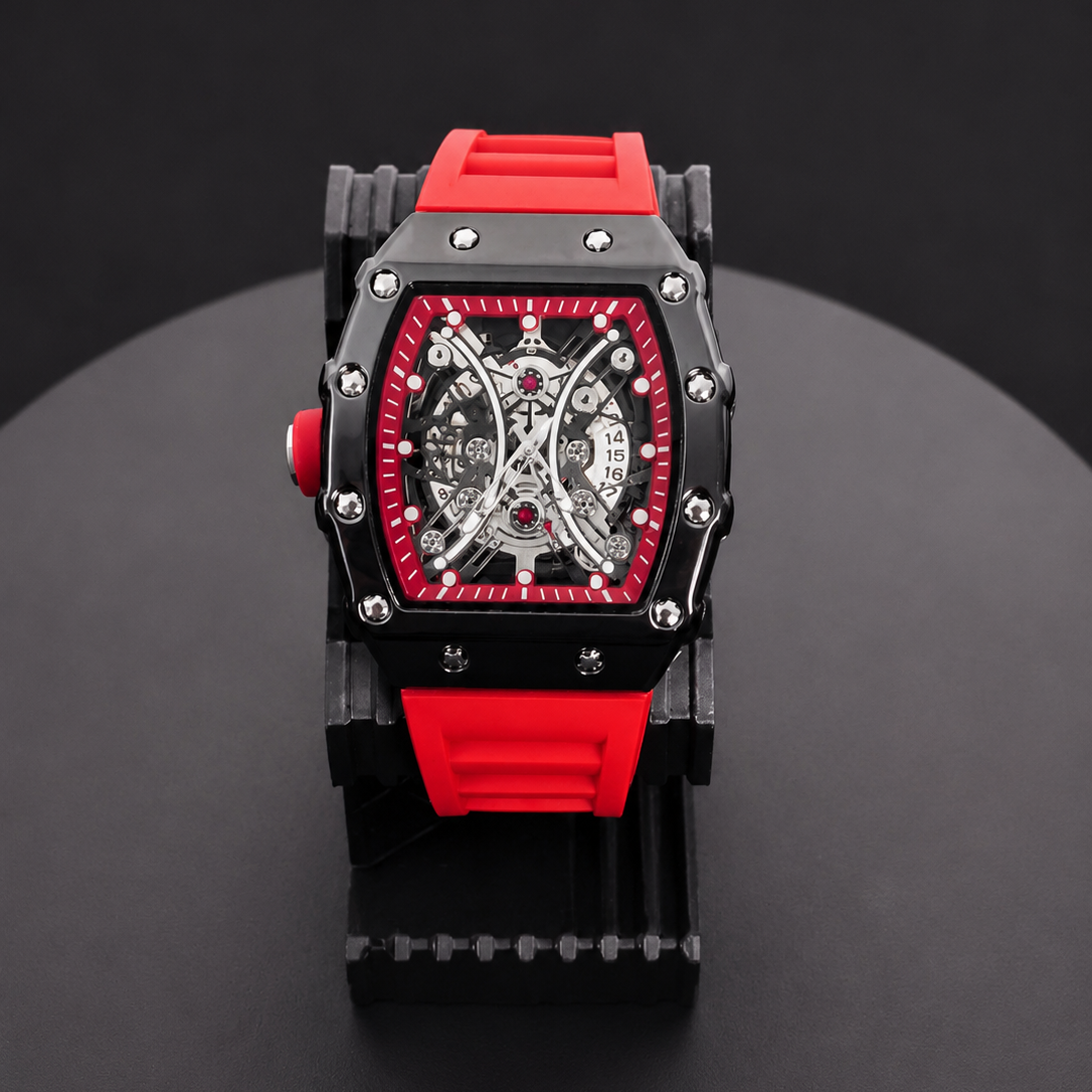 Luxury watch with red and black design on a dark background