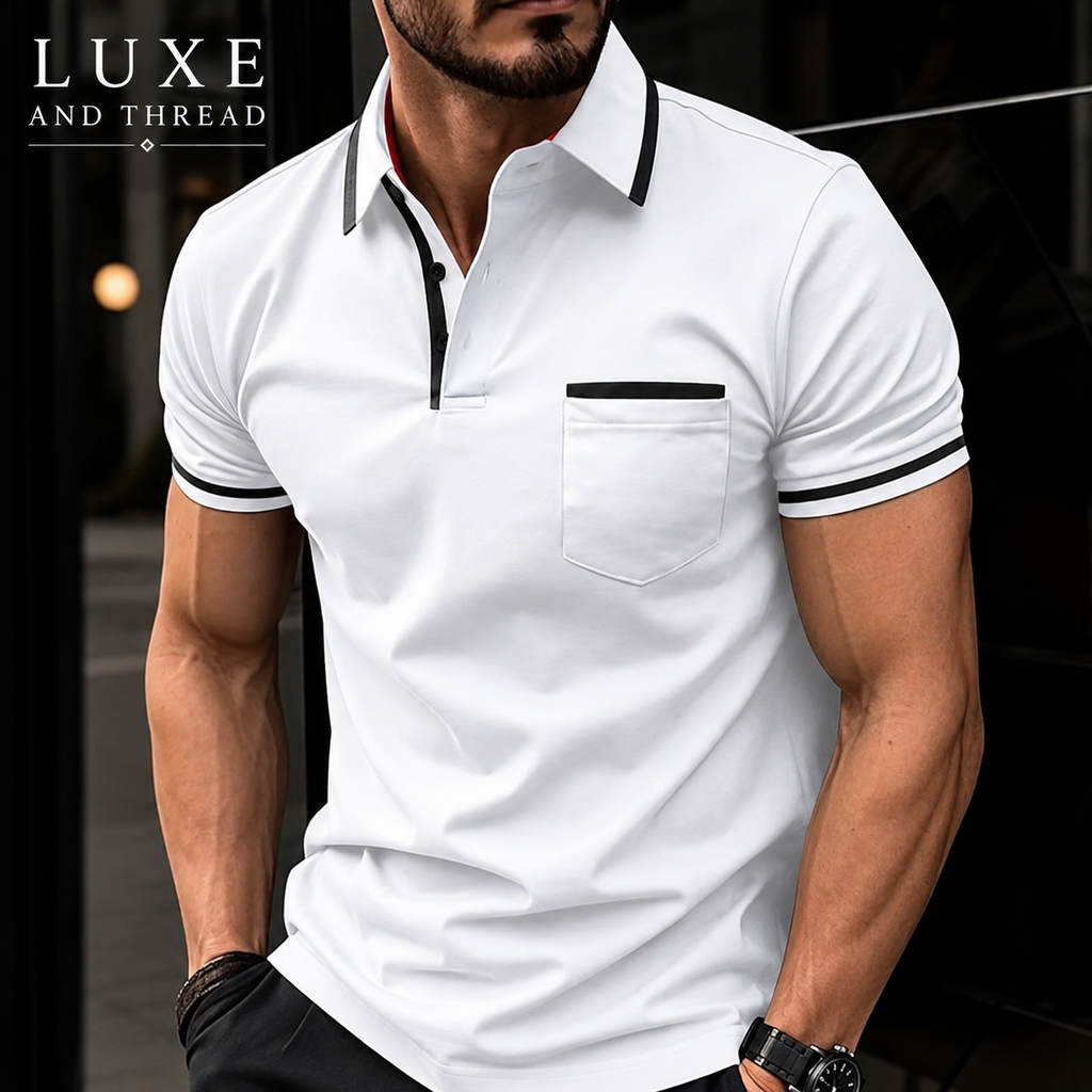 Man wearing a white polo shirt with black accents, branded 'LUXE AND THREAD'.