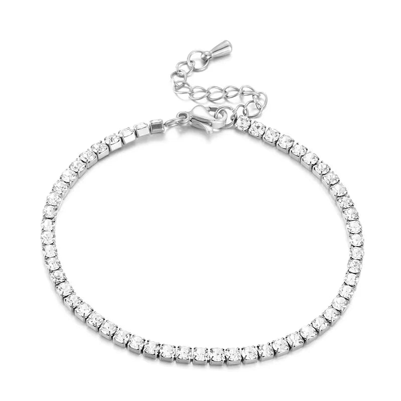 Silver bracelet with clear stones on a white background