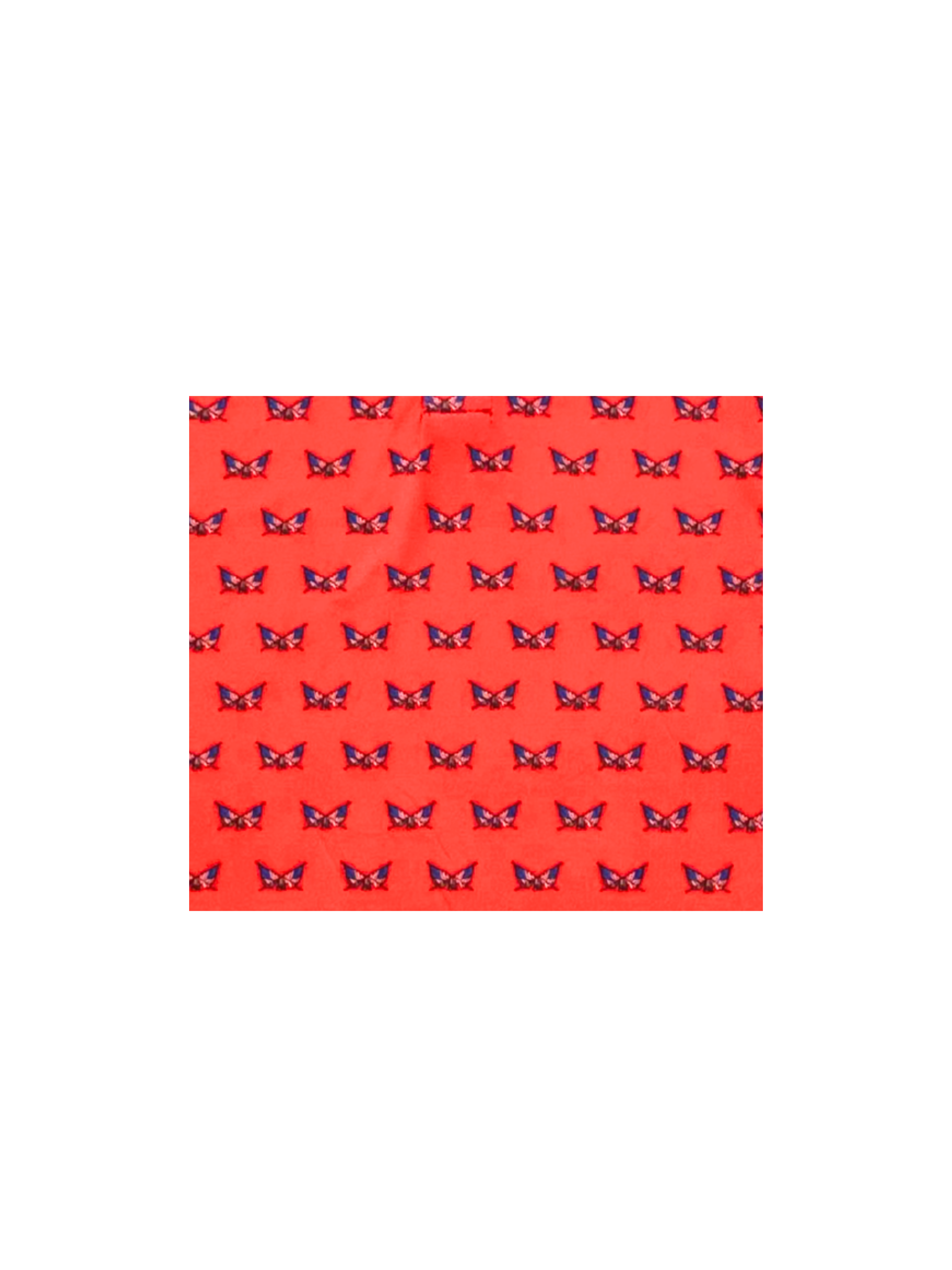 Red fabric with butterfly pattern on a white background