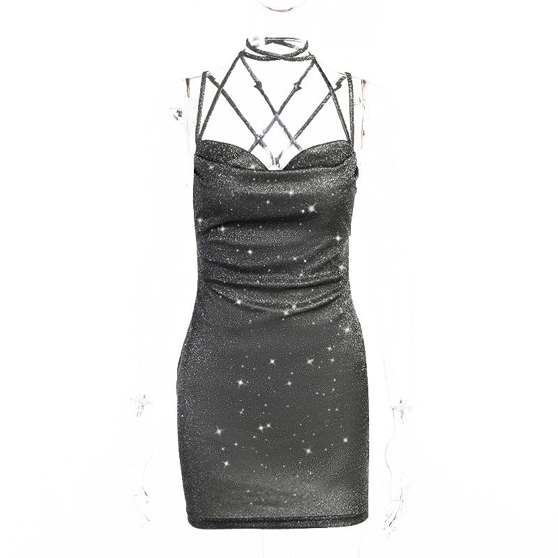 Black sparkly dress with intricate halter design on a white background