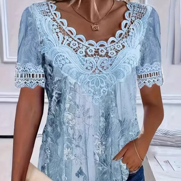 Light blue lace top worn by a person indoors.