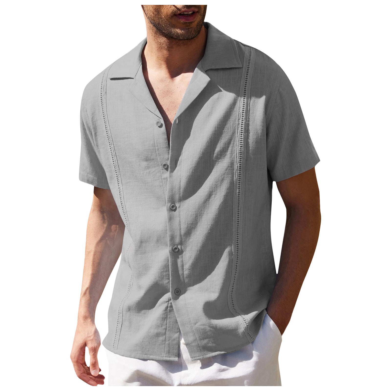 Man wearing a gray short-sleeve shirt on a white background