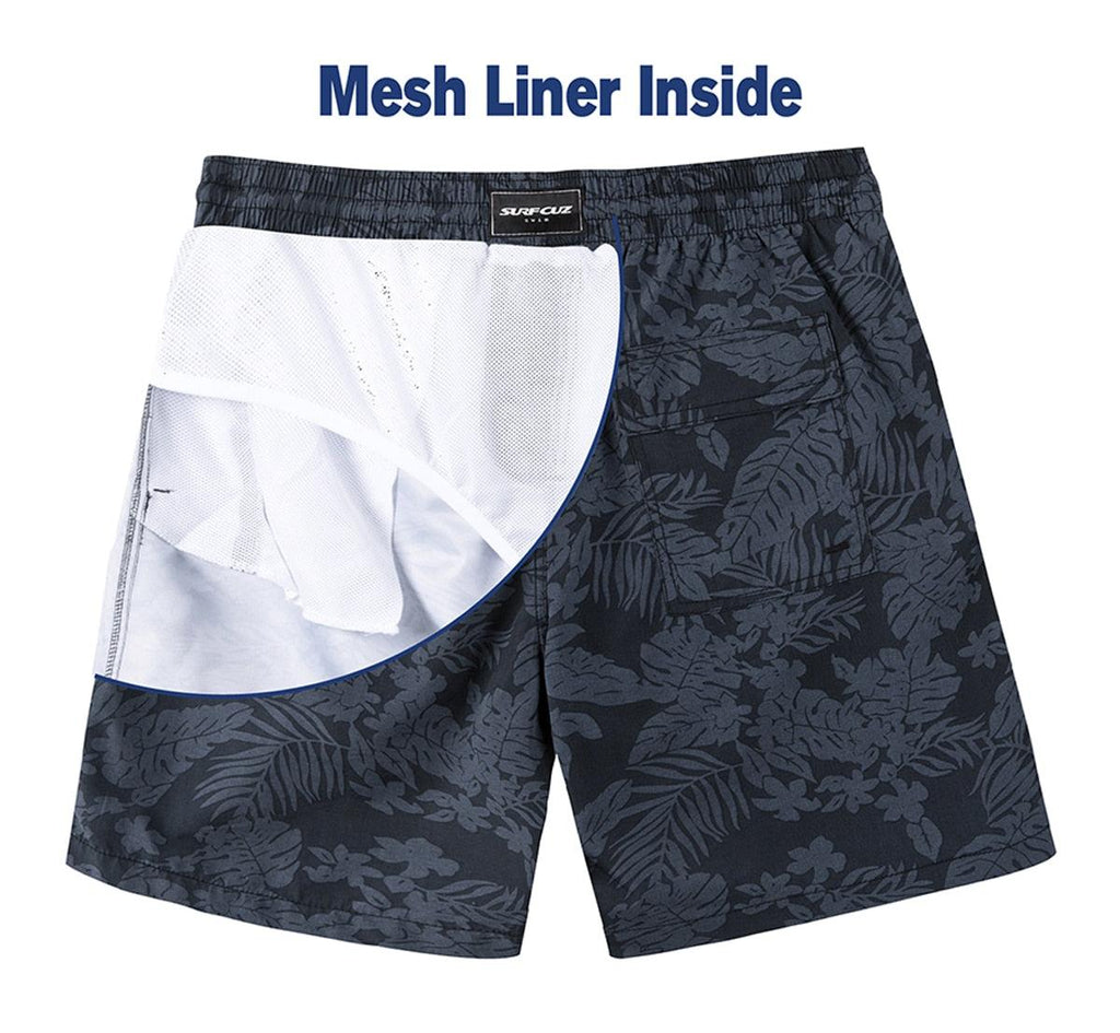 Black floral-patterned shorts with a white mesh liner inside on a white background.